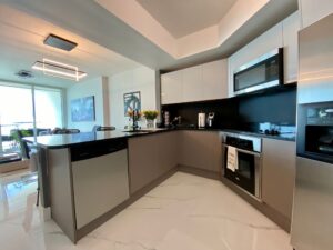 Modern kitchen with sleek cabinetry and built-in appliances.